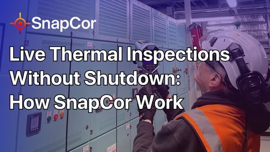Thermographer conducting live electrical thermal inspection on energised switchgear in a data centre without shutdown